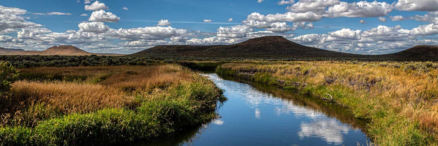 Alan Nyiri Clouds Drift Down The Tranquil Blitzen River Malheur Refuge